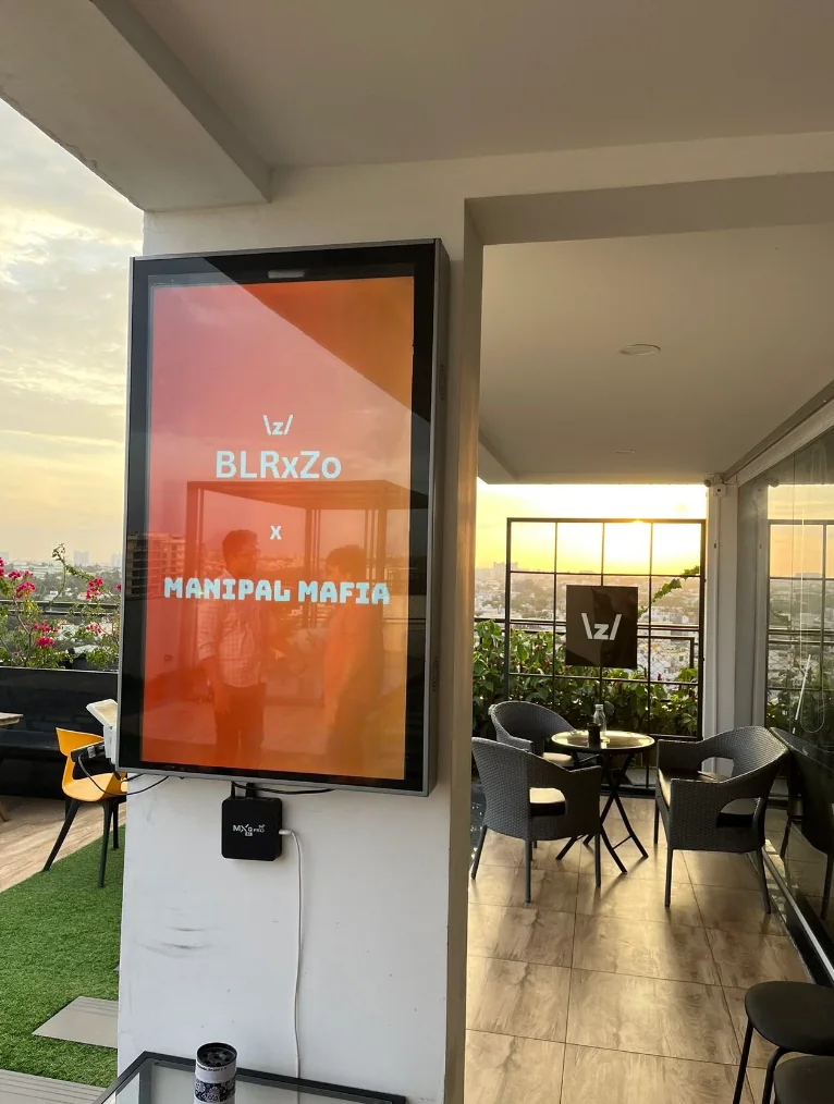 An event display reading Manipal Mafia at a rooftop venue